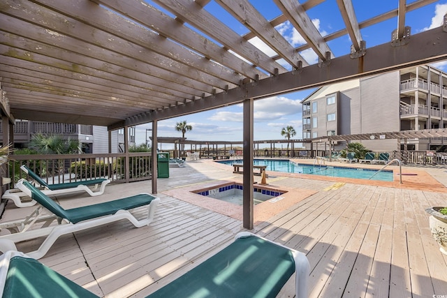 210 N Ocean Blvd Unit 333, North Myrtle Beach, SC 29582 - deck featuring a pergola, a community pool, and a community hot tub