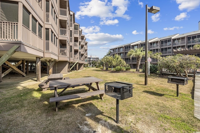 210 N Ocean Blvd Unit 333, North Myrtle Beach, SC 29582 - surrounding community with a yard