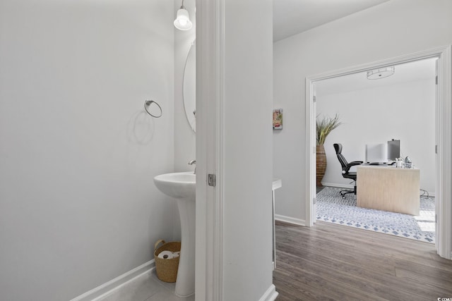 4410 Honir Dr, Myrtle Beach, SC 29579 - bathroom featuring baseboards and wood finished floors