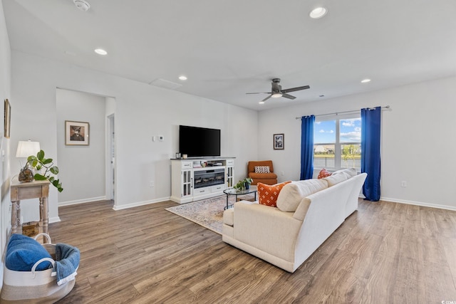 4410 Honir Dr, Myrtle Beach, SC 29579 - living room with wood finished floors, recessed lighting, a ceiling fan, and baseboards