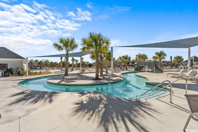 4410 Honir Dr, Myrtle Beach, SC 29579 - community pool featuring a patio