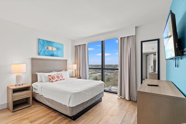 3000 N Ocean Blvd N Unit 1401, Myrtle Beach, SC 29577 - bedroom featuring light wood-style floors