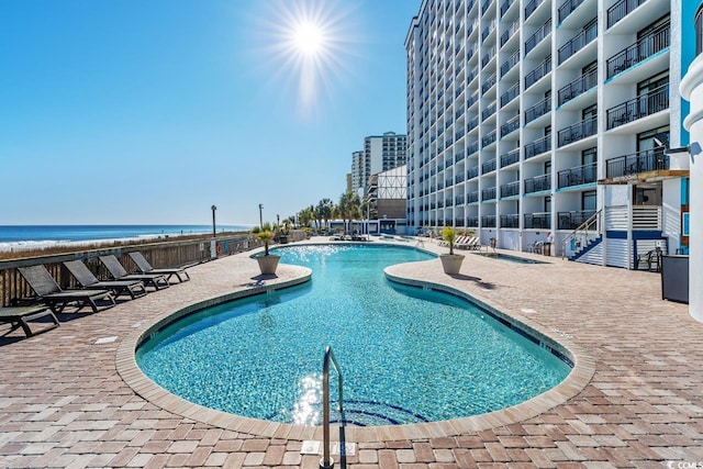 3000 N Ocean Blvd N Unit 1401, Myrtle Beach, SC 29577 - community pool with a patio area
