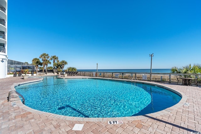 3000 N Ocean Blvd N Unit 1401, Myrtle Beach, SC 29577 - community pool featuring a patio