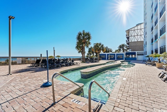 3000 N Ocean Blvd N Unit 1401, Myrtle Beach, SC 29577 - community pool with a patio area