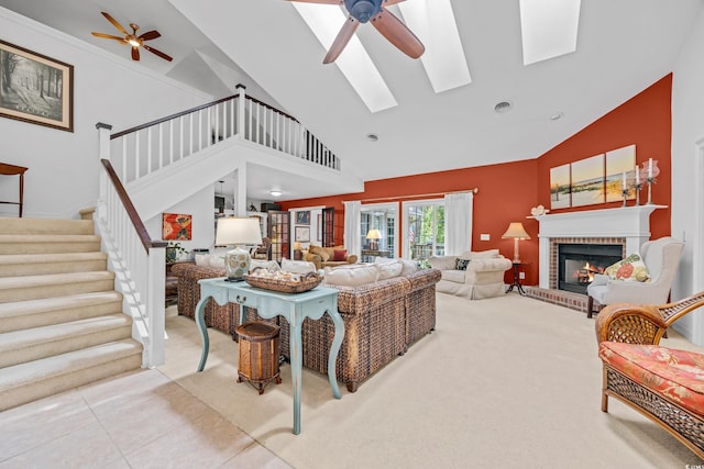 444 Dornoch Dr, Pawleys Island, SC 29585 - living area featuring a ceiling fan, high vaulted ceiling, stairway, a fireplace, and carpet flooring