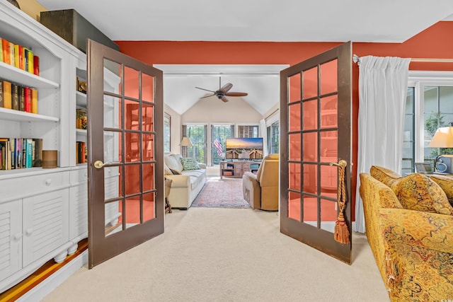 444 Dornoch Dr, Pawleys Island, SC 29585 - hallway featuring french doors, carpet floors, and lofted ceiling
