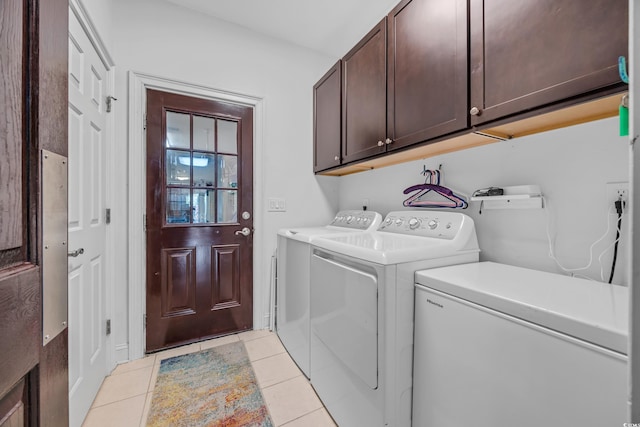 444 Dornoch Dr, Pawleys Island, SC 29585 - laundry room with cabinet space, separate washer and dryer, and light tile patterned floors