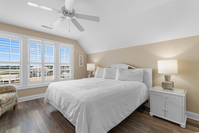 703 S Waccamaw Dr, Garden City Beach, SC 29576 - bedroom featuring lofted ceiling, baseboards, dark wood-style flooring, and ceiling fan