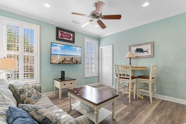 703 S Waccamaw Dr, Garden City Beach, SC 29576 - living room with baseboards, plenty of natural light, wood finished floors, crown molding, and recessed lighting