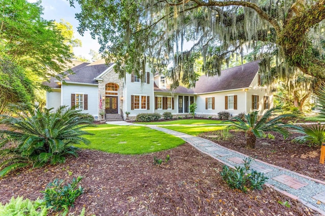 509 Heston Point Dr, Pawleys Island, SC 29585 - view of front of house featuring a front yard and stone siding