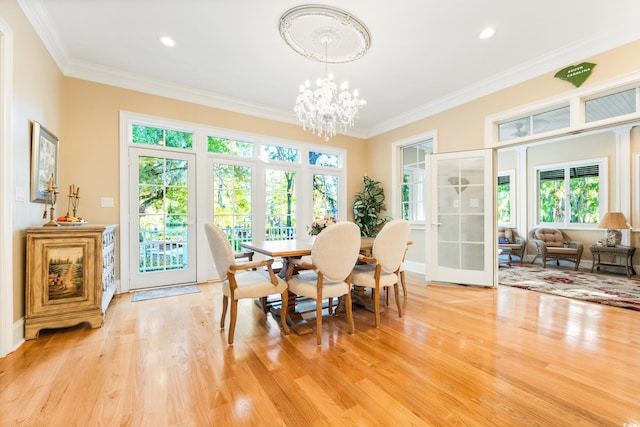 509 Heston Point Dr, Pawleys Island, SC 29585 - dining room with light wood-style flooring, crown molding, a chandelier, baseboards, and recessed lighting