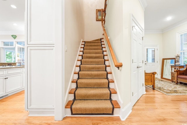 509 Heston Point Dr, Pawleys Island, SC 29585 - stairs with crown molding, wood finished floors, plenty of natural light, recessed lighting, and baseboards
