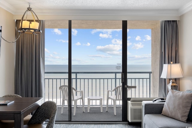 1105 S Ocean Blvd Unit 928, Myrtle Beach, SC 29577 - sunroom featuring a water view and a chandelier