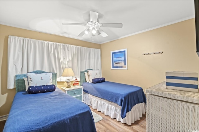 207 N 3rd Ave N Unit 247, North Myrtle Beach, SC 29582 - bedroom with wood finished floors, crown molding, and a ceiling fan