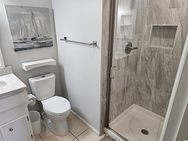 207 N 3rd Ave N Unit 247, North Myrtle Beach, SC 29582 - bathroom featuring tile patterned flooring, a stall shower, vanity, and toilet