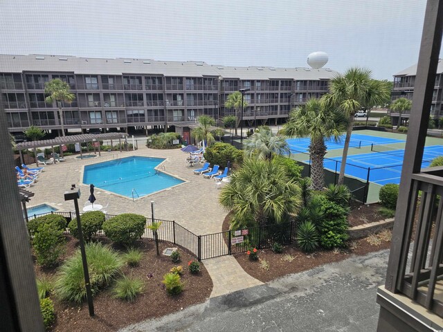 207 N 3rd Ave N Unit 247, North Myrtle Beach, SC 29582 - community pool with a patio and a gate