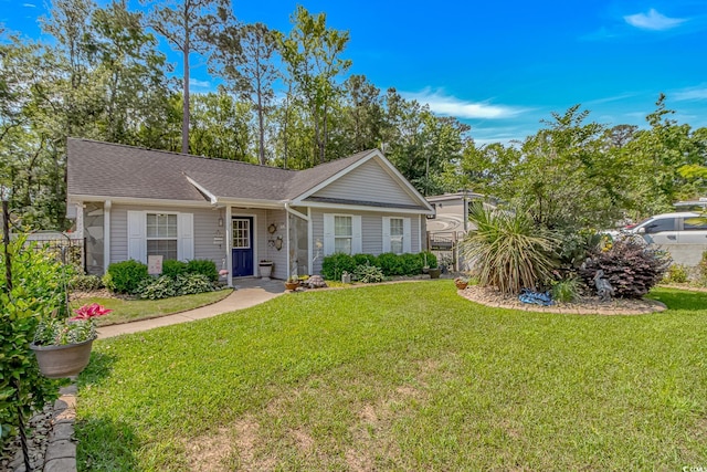 3827 El Duce Pl, Myrtle Beach, SC 29588 - ranch-style home with a front lawn and roof with shingles