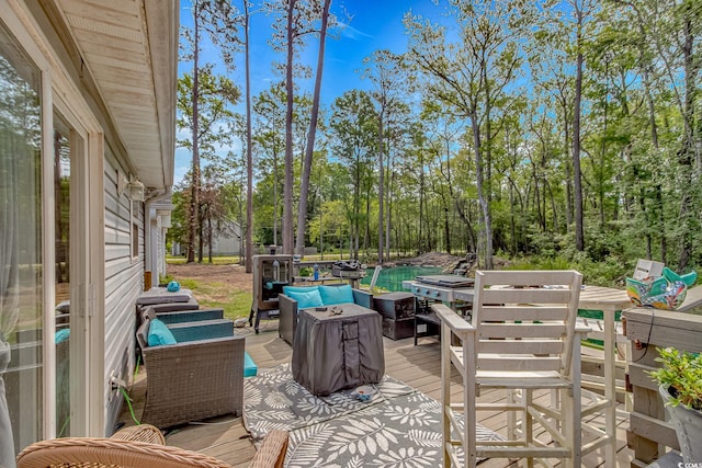 3827 El Duce Pl, Myrtle Beach, SC 29588 - view of patio / terrace featuring a wooden deck and an outdoor hangout area