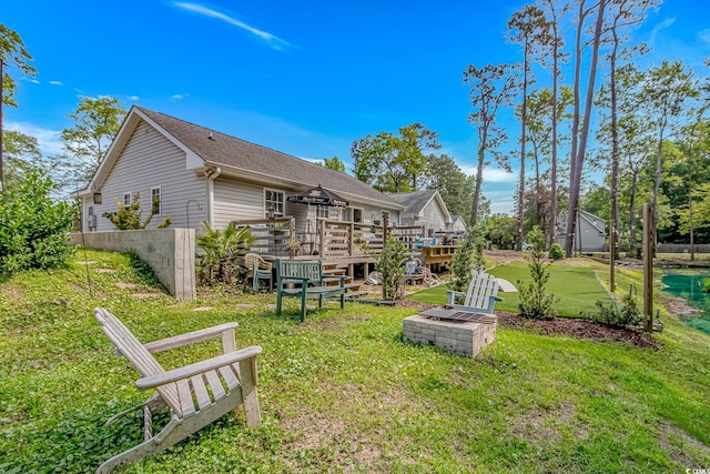 3827 El Duce Pl, Myrtle Beach, SC 29588 - view of green lawn with a deck