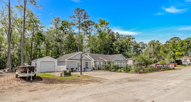 3827 El Duce Pl, Myrtle Beach, SC 29588 - view of front facade with view of scattered trees, an outdoor structure, and a detached garage
