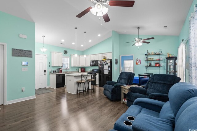 4338 Grande Harbour Blvd, Little River, SC 29566 - living room featuring ceiling fan, high vaulted ceiling, dark wood finished floors, recessed lighting, and baseboards
