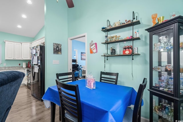 4338 Grande Harbour Blvd, Little River, SC 29566 - dining space featuring lofted ceiling, light wood finished floors, ceiling fan, recessed lighting, and a dry bar