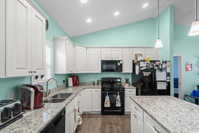 4338 Grande Harbour Blvd, Little River, SC 29566 - kitchen featuring black appliances, a sink, white cabinets, high vaulted ceiling, and wood finished floors