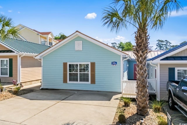 4338 Grande Harbour Blvd, Little River, SC 29566 - view of front of property featuring a standing seam roof and metal roof