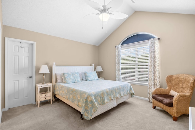 bedroom with lofted ceiling, carpet flooring, ceiling fan, and baseboards
