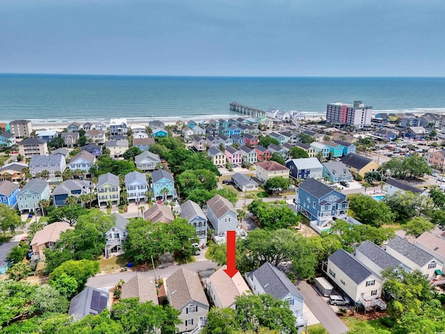 aerial perspective of suburban area featuring a large body of water