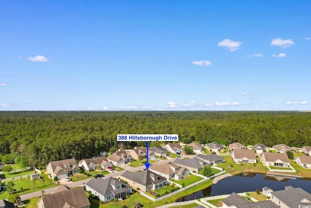 388 Hillsborough Dr, Conway, SC 29526 - aerial perspective of suburban area featuring a forest and a nearby body of water