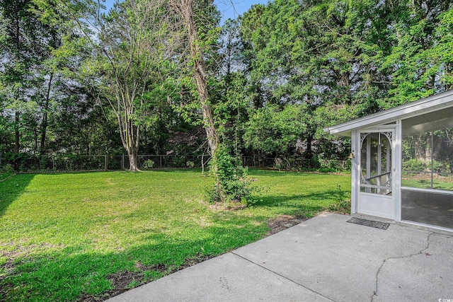 4311 Bradford Cir, Myrtle Beach, SC 29588 - view of yard with a sunroom and a patio