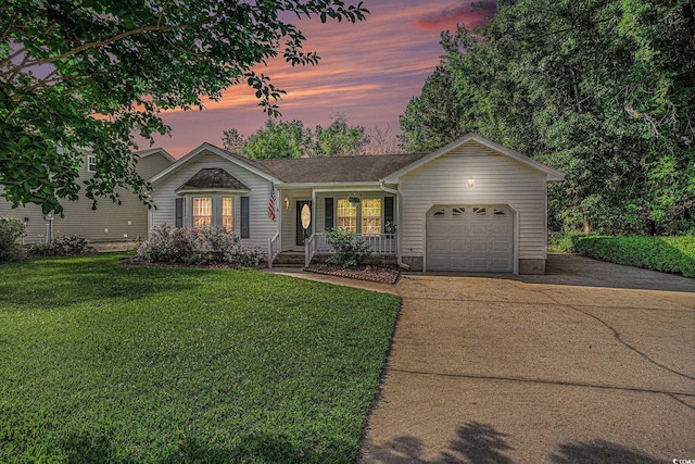 4311 Bradford Cir, Myrtle Beach, SC 29588 - ranch-style home with a porch, a garage, concrete driveway, and a front yard