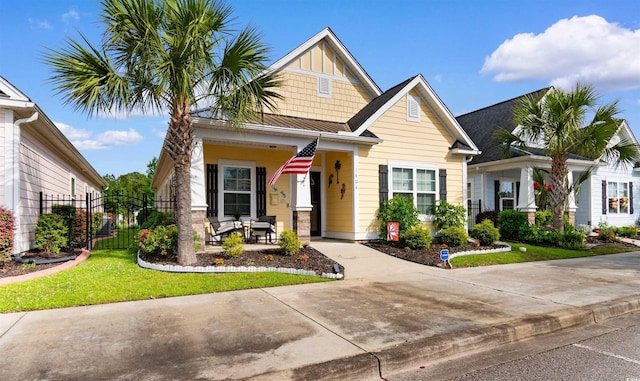 1404 Riverport Dr, Conway, SC 29526 - view of front of home featuring covered porch and a standing seam roof
