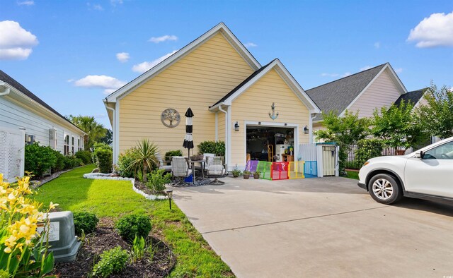 1404 Riverport Dr, Conway, SC 29526 - view of front of home with concrete driveway, an attached garage, and a front yard
