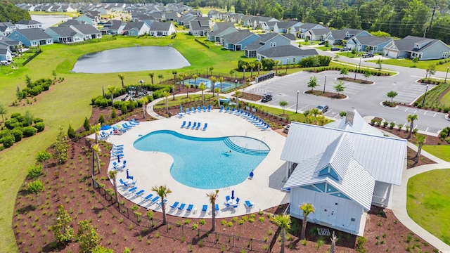 aerial perspective of suburban area with a pool