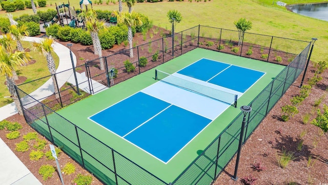 view of sport court with a tennis court