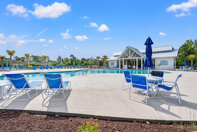 community pool with a patio