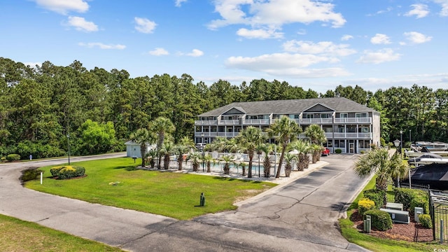 4506 W Harbor Ct Unit U-15, Little River, SC 29566 - view of front of property with an outdoor pool