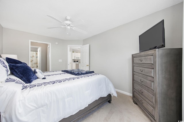 4506 W Harbor Ct Unit U-15, Little River, SC 29566 - bedroom featuring light colored carpet, ensuite bathroom, and a ceiling fan