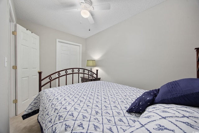 4506 W Harbor Ct Unit U-15, Little River, SC 29566 - bedroom featuring carpet, a textured ceiling, a closet, and ceiling fan