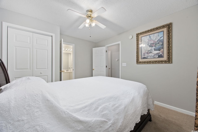 4506 W Harbor Ct Unit U-15, Little River, SC 29566 - carpeted bedroom with a closet, a textured ceiling, a ceiling fan, and ensuite bathroom