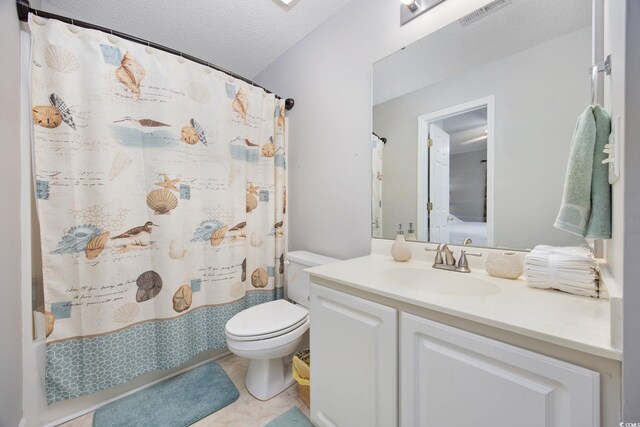 4506 W Harbor Ct Unit U-15, Little River, SC 29566 - bathroom featuring vanity, a textured ceiling, and shower / tub combo