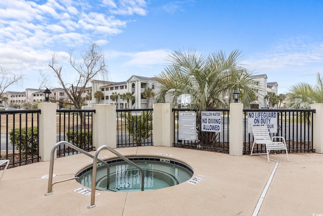 4506 W Harbor Ct Unit U-15, Little River, SC 29566 - view of swimming pool featuring a community hot tub and a residential view
