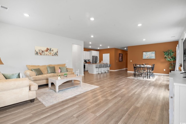 3021 Sistine St, Myrtle Beach, SC 29579 - living area featuring light wood-type flooring, recessed lighting, and baseboards