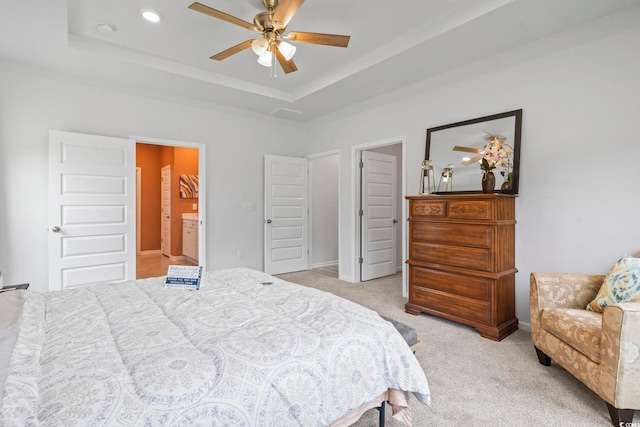 3021 Sistine St, Myrtle Beach, SC 29579 - bedroom featuring light colored carpet, a raised ceiling, baseboards, ceiling fan, and connected bathroom