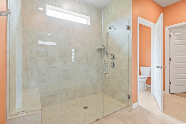 3021 Sistine St, Myrtle Beach, SC 29579 - bathroom featuring a shower stall, tile patterned floors, and toilet