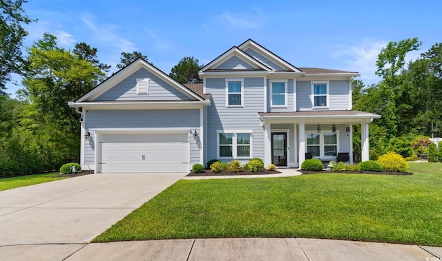 818 Mourning Dove Dr, Myrtle Beach, SC 29577 - view of front of property featuring an attached garage, a front yard, concrete driveway, and covered porch