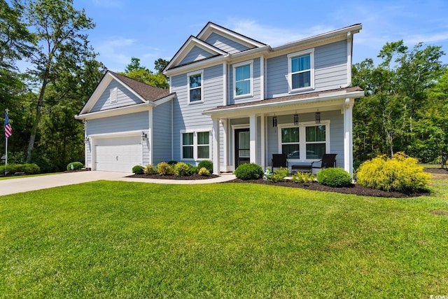 818 Mourning Dove Dr, Myrtle Beach, SC 29577 - view of front of house featuring covered porch, driveway, a garage, and a front yard